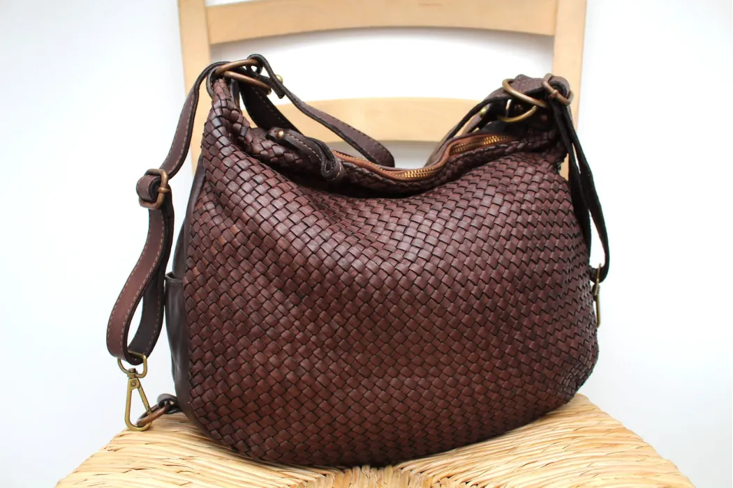 how should brands choose between woven and leather