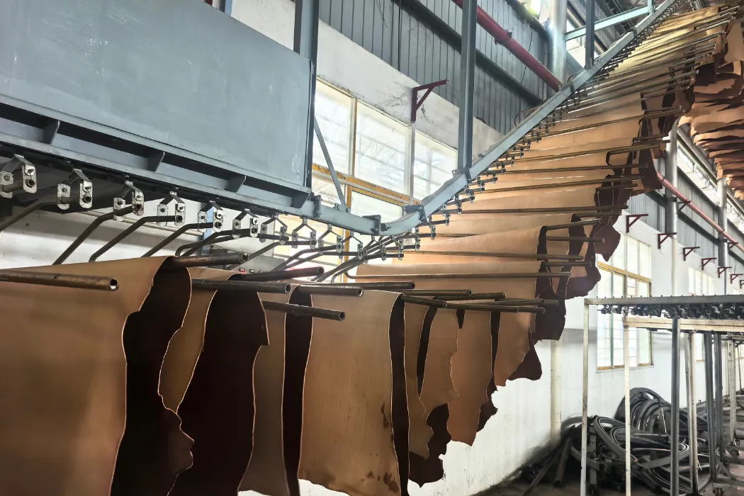 raw animal hides being soaked in large vats during the pre tanning process at a tannery.