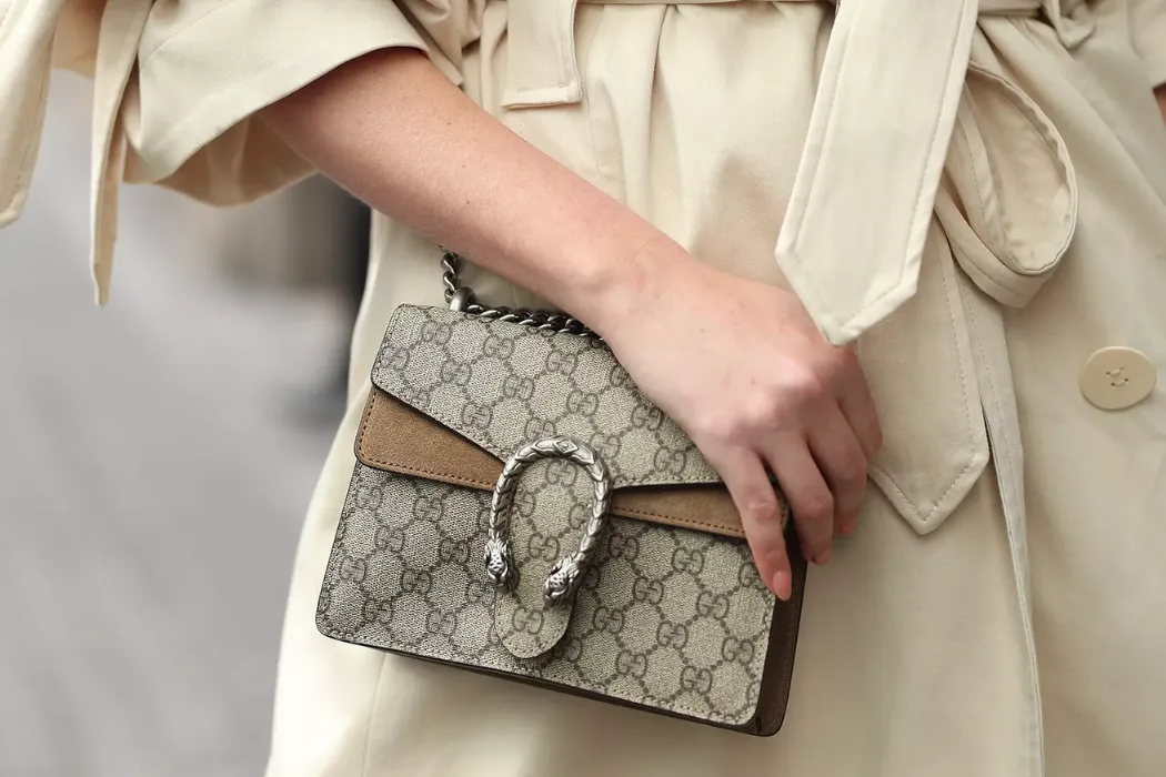 what criteria define a top tier designer crossbody bag