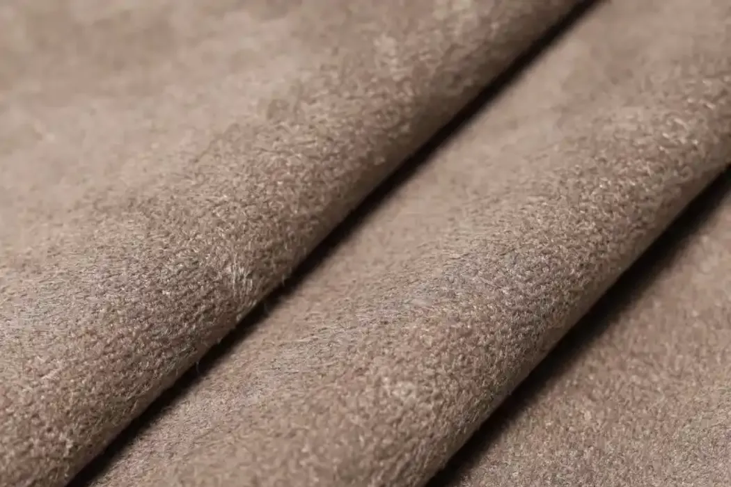 how is suede leather manufactured in a tannery