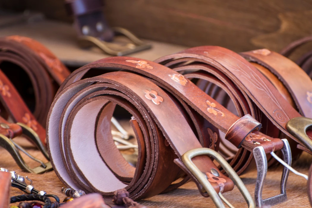 clicker presses vs. cnc cutting systems in high volume leather belt production