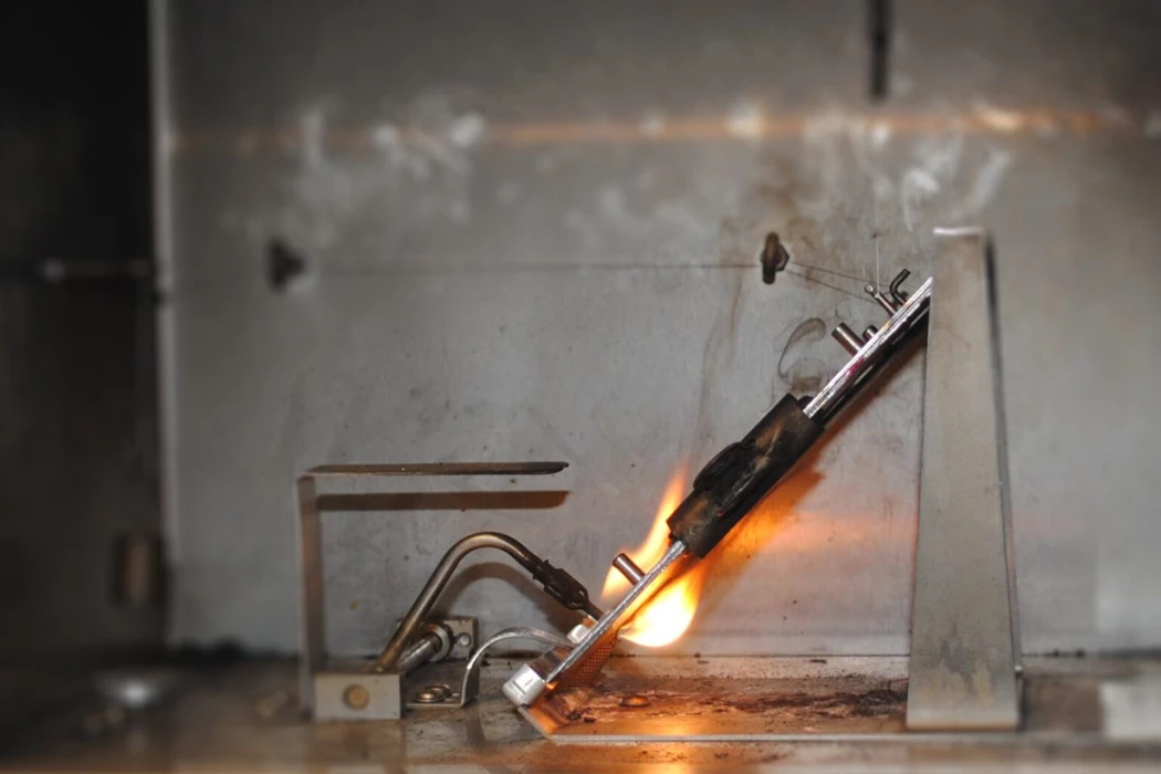 how do engineers treat leather to pass flammability tests