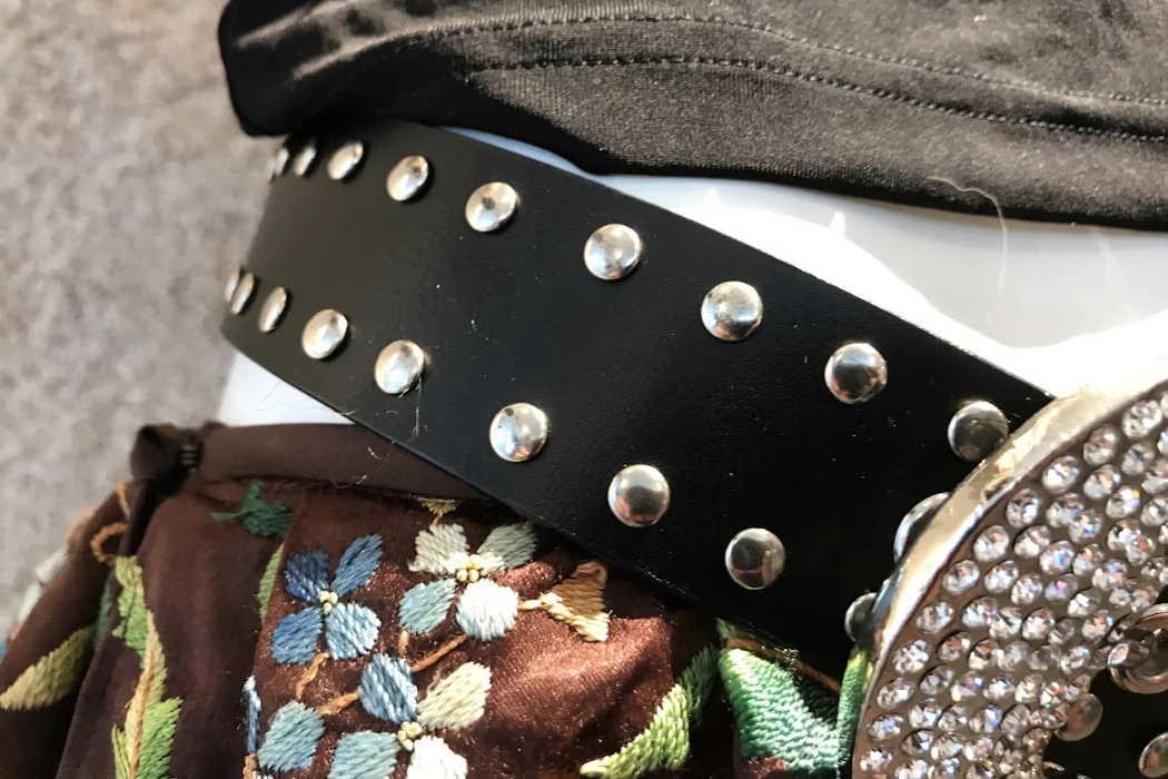 how do manufacturers attach rhinestones without them falling off